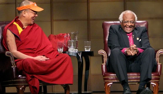 The Dalai Lama with Bishop Desmond Tutu · an example of Buddhist–Christian encounter, not a photograph of the 1994 Gospel seminar